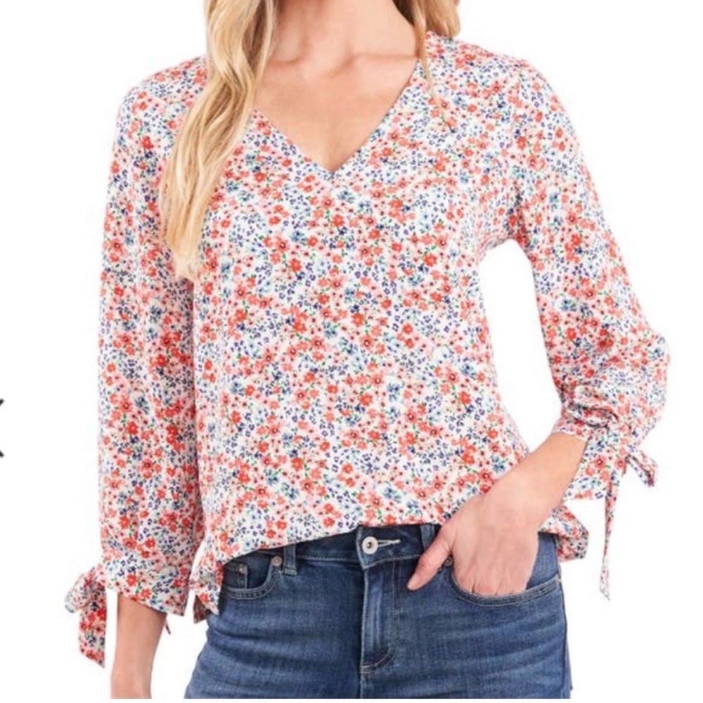 CeCe Marbella ditzy Tie sleeve floral print top size medium.,